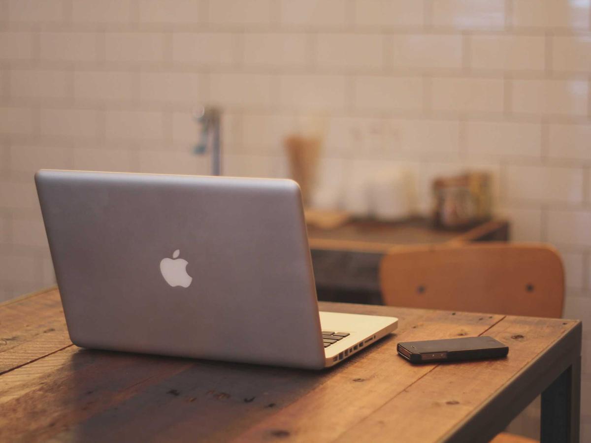 A developer working at a desk with two monitors